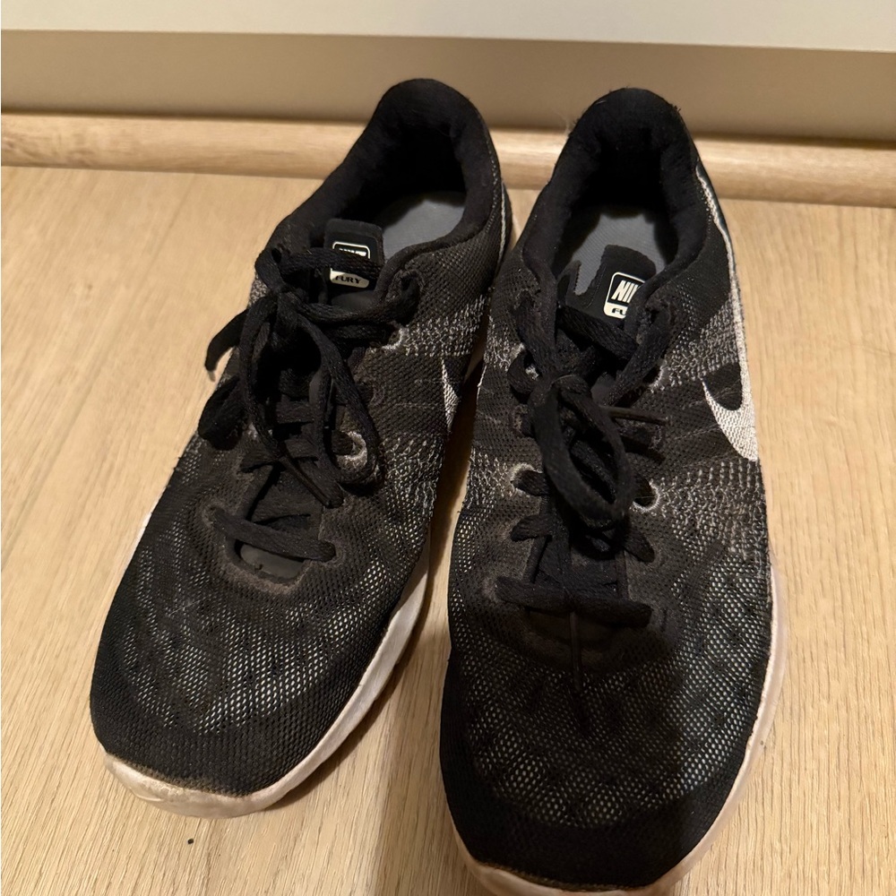 Nike Black and White Sneakers with Sleek Design